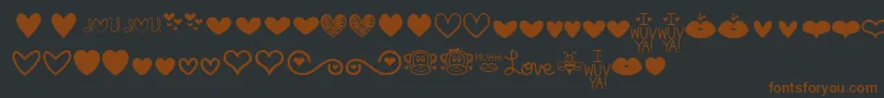 MfLoveDings-fontti – ruskeat fontit mustalla taustalla