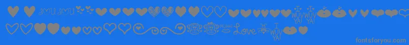 Czcionka MfLoveDings – szare czcionki na niebieskim tle