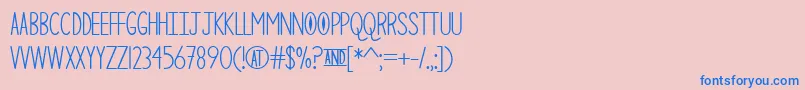 フォントTheCuriousCat – ピンクの背景に青い文字