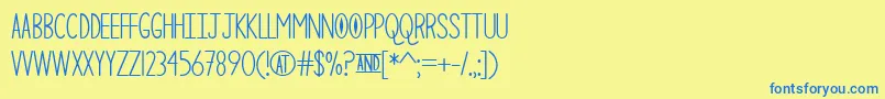 TheCuriousCat Font – Blue Fonts on Yellow Background