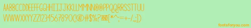 TheCuriousCat Font – Orange Fonts on Green Background