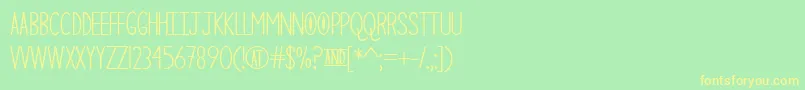 TheCuriousCat Font – Yellow Fonts on Green Background