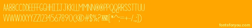 TheCuriousCat Font – Yellow Fonts on Orange Background