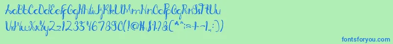 RagatniaClara-Schriftart – Blaue Schriften auf grünem Hintergrund