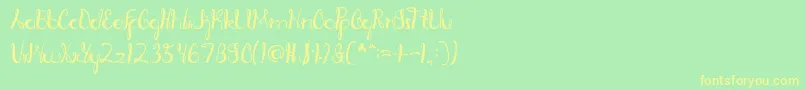 RagatniaClara Font – Yellow Fonts on Green Background