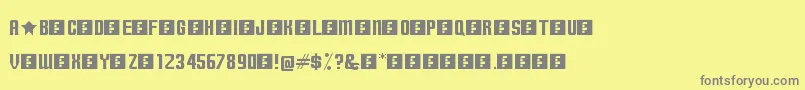 TerminallyChisseled Font – Gray Fonts on Yellow Background
