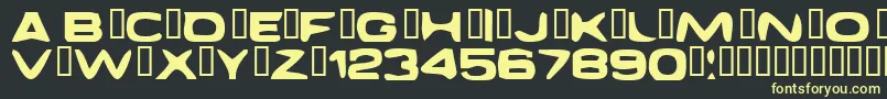 フォントDaggmaskNormal – 黒い背景に黄色の文字