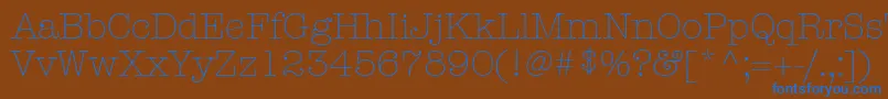 ItcAmericanTypewriterLtLightAlternate-fontti – siniset fontit ruskealla taustalla