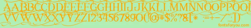 Annabel1-Schriftart – Orangefarbene Schriften auf grünem Hintergrund