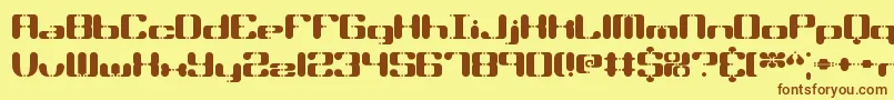 フォントSyndromeBrk – 茶色の文字が黄色の背景にあります。