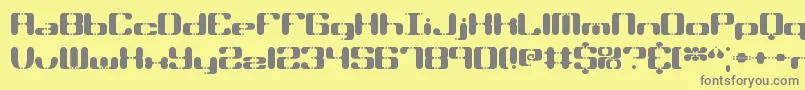 フォントSyndromeBrk – 黄色の背景に灰色の文字