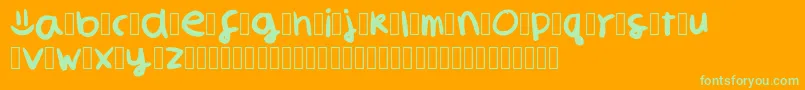 SmilelibredemoversionaRegular-fontti – vihreät fontit oranssilla taustalla