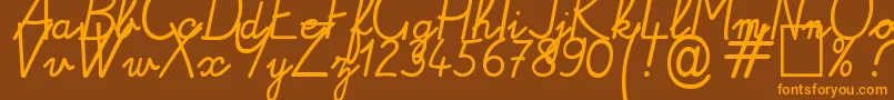 Alamain Font – Orange Fonts on Brown Background