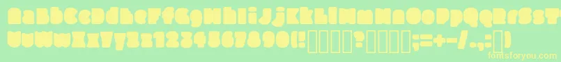 SlukoniFat-fontti – keltaiset fontit vihreällä taustalla