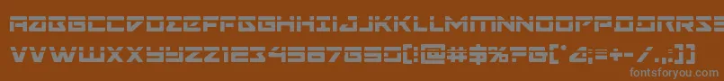 Navycadetlaser-fontti – harmaat kirjasimet ruskealla taustalla