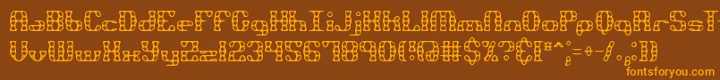 Brassknuckle-Schriftart – Orangefarbene Schriften auf braunem Hintergrund