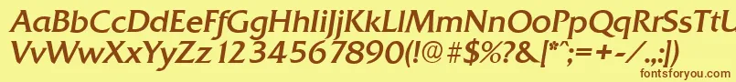 フォントQuadratserialItalic – 茶色の文字が黄色の背景にあります。