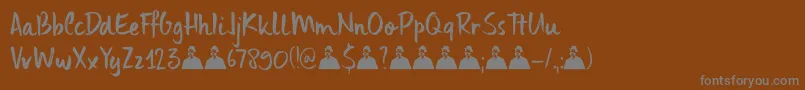 フォントDkUncleEdward – 茶色の背景に灰色の文字