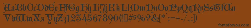 フォントWestminstergotisch – 黒い文字が茶色の背景にあります