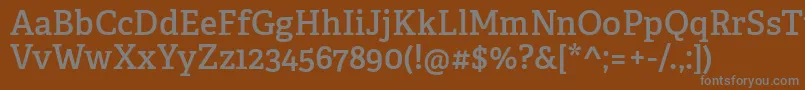 AdelleCyrillicSemibold-fontti – harmaat kirjasimet ruskealla taustalla