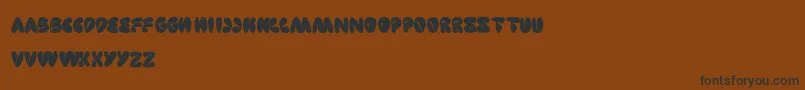 SleepingBeauty Font – Black Fonts on Brown Background