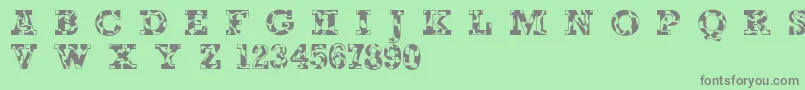 Happycow Font – Gray Fonts on Green Background