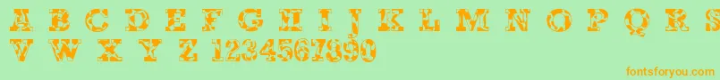 Happycow Font – Orange Fonts on Green Background
