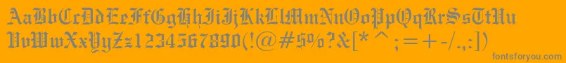 EngraversOldEnglishBt-Schriftart – Graue Schriften auf orangefarbenem Hintergrund