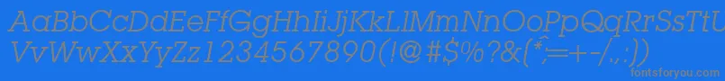 フォントL850SlabItalic – 青い背景に灰色の文字