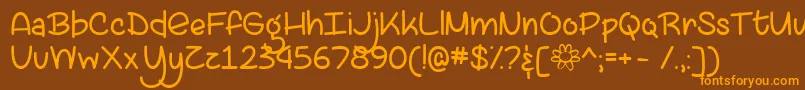 フォントLazySpringDayTtf – オレンジ色の文字が茶色の背景にあります。