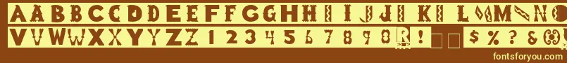 ToyBlockMedium-Schriftart – Gelbe Schriften auf braunem Hintergrund