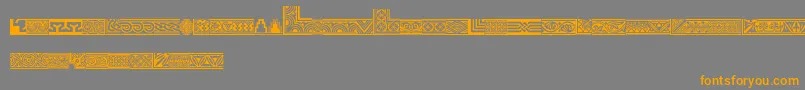 フォントHenmanpicttwo – オレンジの文字は灰色の背景にあります。