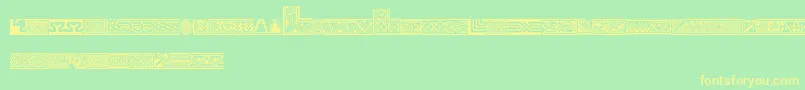 Henmanpicttwo Font – Yellow Fonts on Green Background
