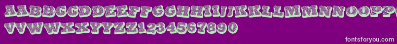 BlackSpiral Font – Green Fonts on Purple Background