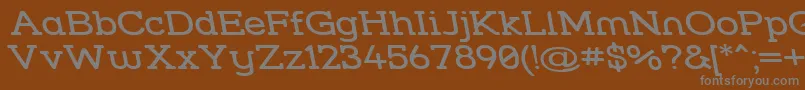 フォントStrslwr – 茶色の背景に灰色の文字