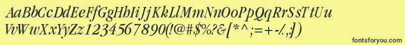 GaramondcondsskItalic-Schriftart – Schwarze Schriften auf gelbem Hintergrund
