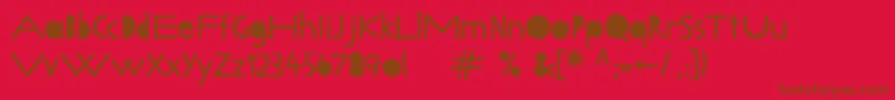 Fonte Lillybeta – fontes marrons em um fundo vermelho