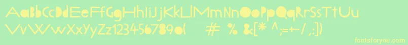 フォントLillybeta – 黄色の文字が緑の背景にあります
