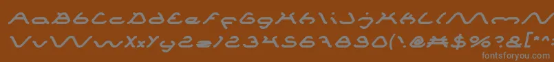 フォントSpiderItalic – 茶色の背景に灰色の文字