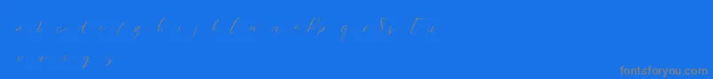 Sweetpattersondemo-Schriftart – Graue Schriften auf blauem Hintergrund