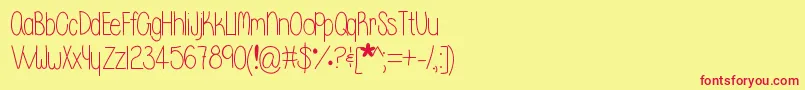 フォントWhisperadream – 赤い文字の黄色い背景