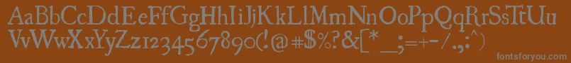 Uglyqua Font – Gray Fonts on Brown Background