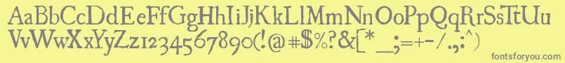 Uglyqua Font – Gray Fonts on Yellow Background