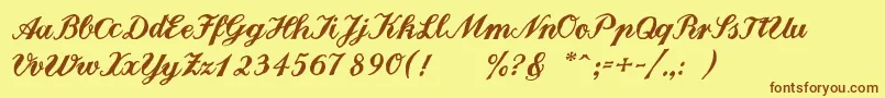 フォントLandliebe – 茶色の文字が黄色の背景にあります。