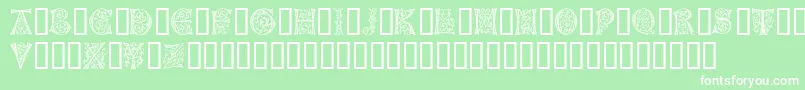 フォントGermanCaps – 緑の背景に白い文字