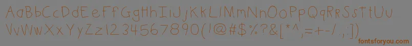 Kbkinderwrite Font – Brown Fonts on Gray Background