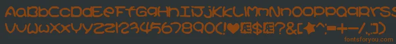 Kirbyss Font – Brown Fonts on Black Background