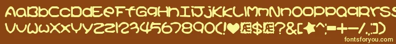 Kirbyss Font – Yellow Fonts on Brown Background