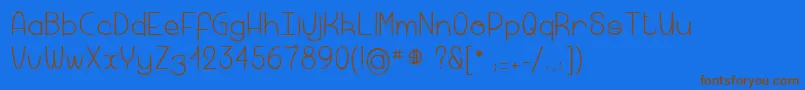Macaronicheese Font – Brown Fonts on Blue Background
