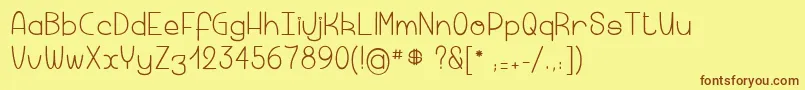Macaronicheese Font – Brown Fonts on Yellow Background